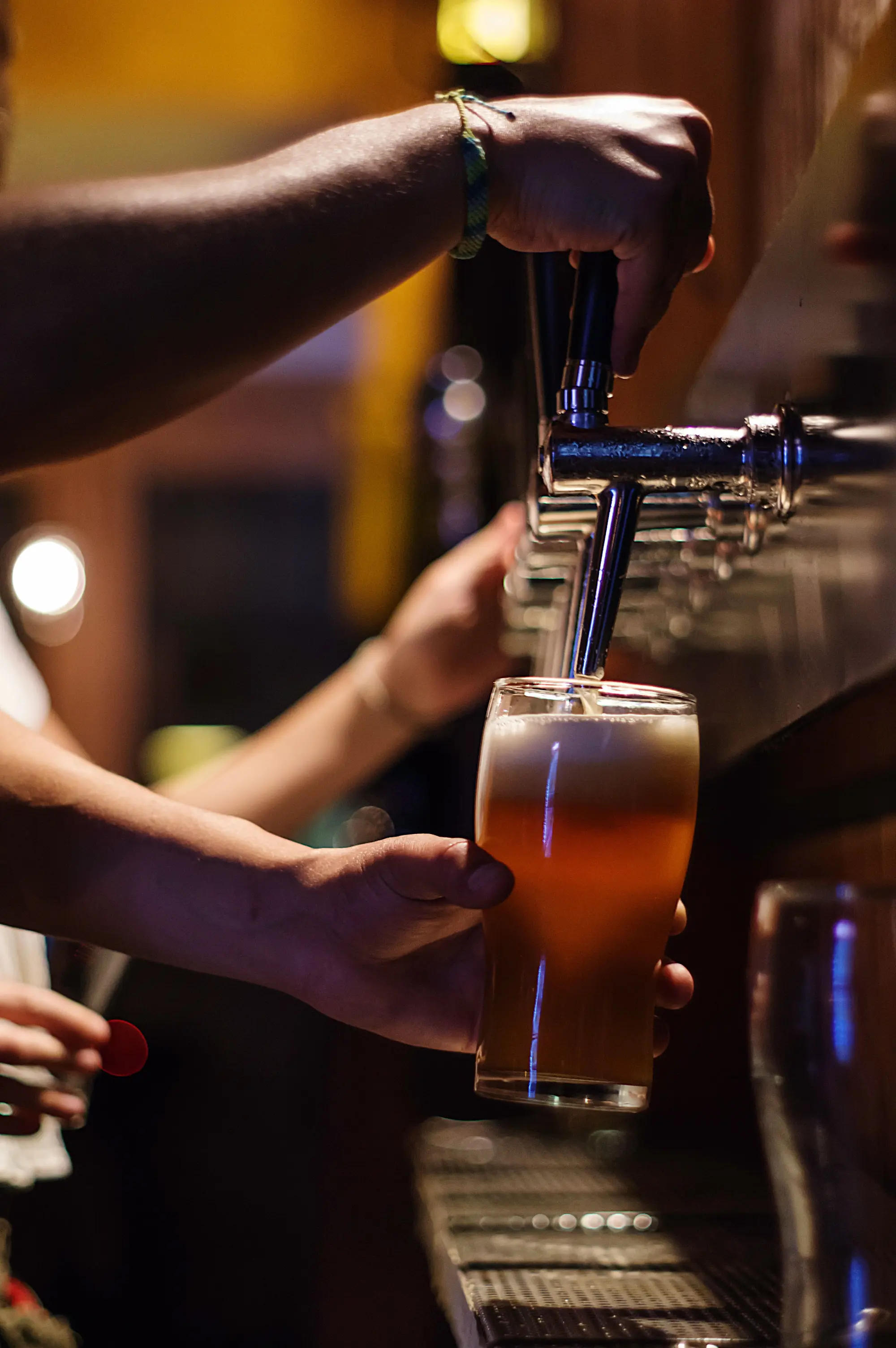 People enjoying a part in a bar