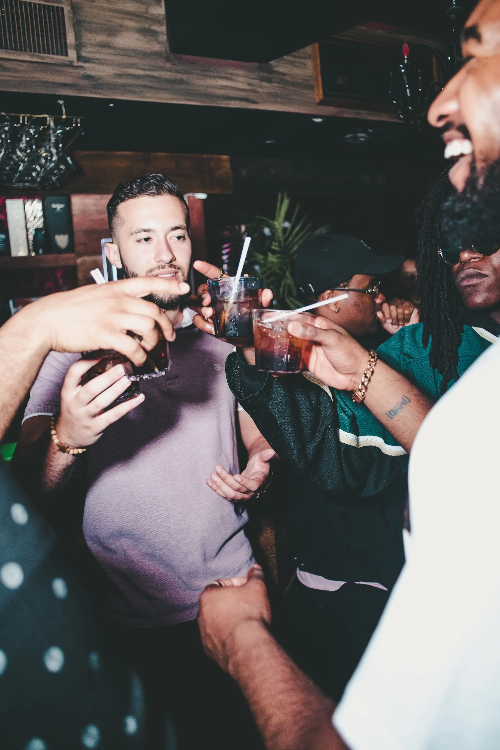 People enjoying a part in a bar